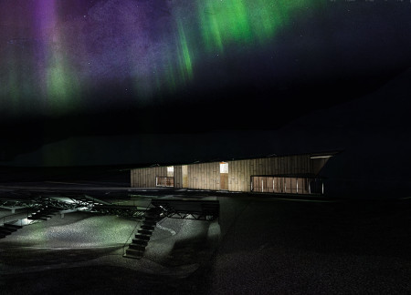 Charred Wooden Shingles and Exposed Concrete Embrace Cultural Spaces Amidst the Northern Lights