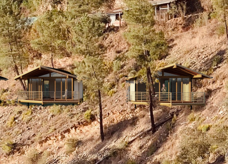 Charred Wooden Shingles and Native Materials Form a Modular Retreat in the Mountains  