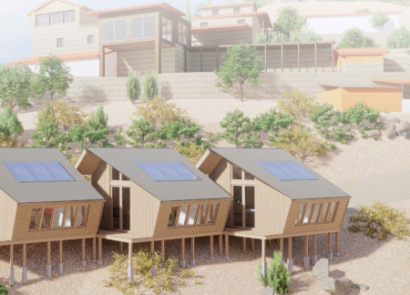 Timber Cabins Featuring Charred Wooden Shingles and Passive Solar Design in a Serene Landscape