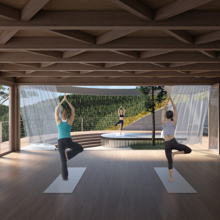 Reflective Aluminum Facade and Circular Timber Studio in Forest Setting  