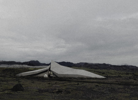 Basalt Stone Facade and Glass Connection Enhance Community Spaces in Icelandic Landscape