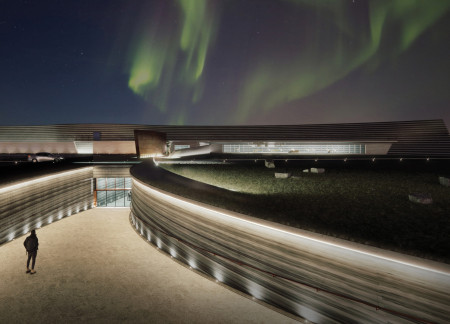 Weathered Corten Steel and Natural Stone Embrace in a Curvilinear Visitor Centre Hybridizing Landscape and Culture