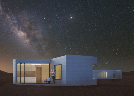 Circular Lodge Featuring Sandstone And Photovoltaic Panels in Desert Landscape