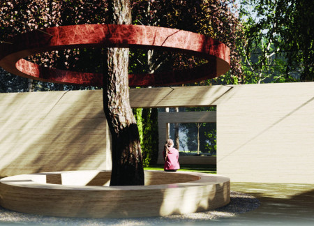 Memorial space featuring regional limestone and a suspended red metal ring for reflection and connection to nature