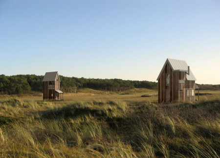 Charred Wooden Shingles and Weathered Timber Create a Coastal Retreat Emphasizing Natural Light and Outdoor Living