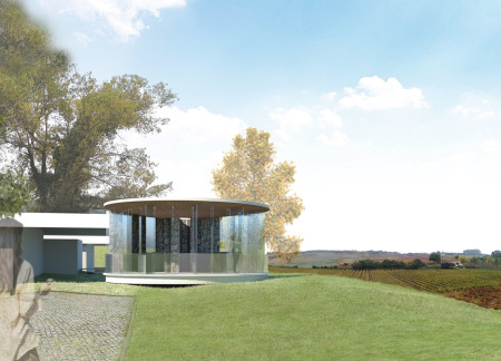 Circular Façade of Perforated Metal and Glass Complementing Local Stone in a Wine Tasting Room