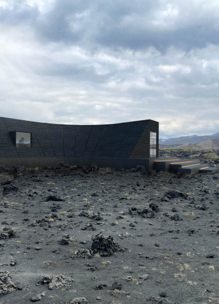 Café Incorporating Burnt Wood and Panoramic Glass in a Volcanic Landscape