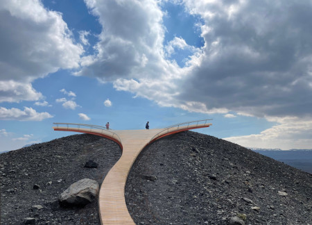 Cantilevered Corten Steel Lookout Crafted from Weather-Resistant Timber Over Volcanic Terrain  