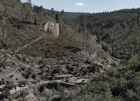 Charred Wooden Shingles and Elevated Design in a Mountainous Shelter for Outdoor Enthusiasts