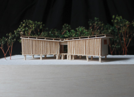 Symmetrical Sheltering With Sustainable Vulcan Cladding And Double-Glazed Timber Windows