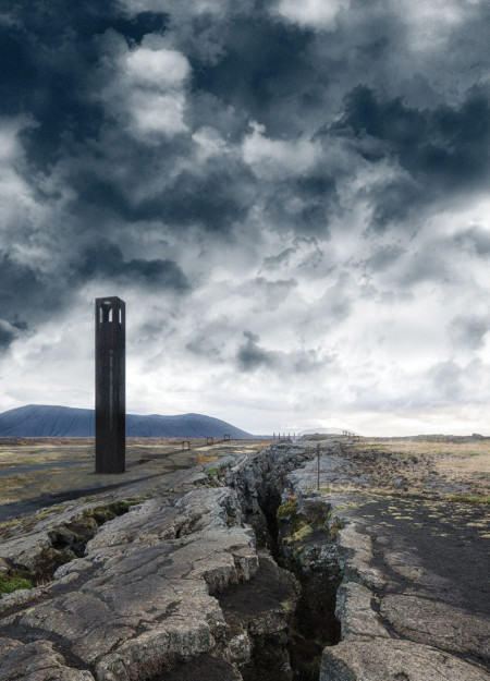 Geothermal Observation Tower Featuring Carbondized Wood and Natural Stone Integration  