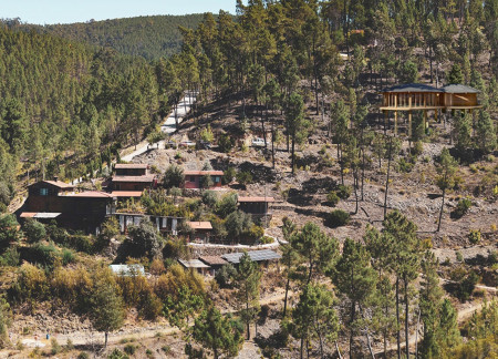 Rammed Earth and Natural Timber Sanctuary Emphasizing Mindfulness Through Community Spaces  
