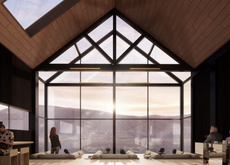 Charred Timber Cladding Reflecting Volcanic Landscape in a Cozy Hiker Café