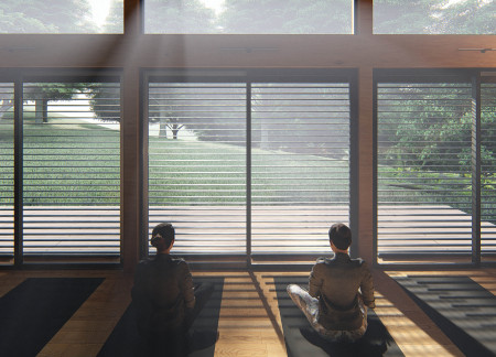Cedar Wood Structure with Expansive Glazing Integrated into a Forested Landscape
