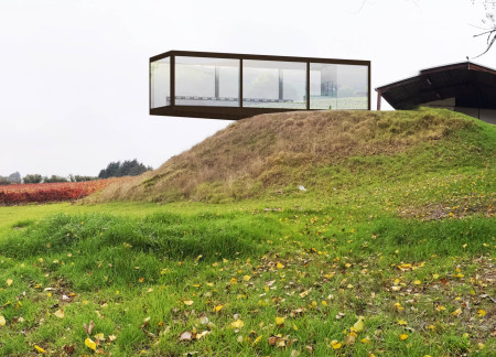 Cantilevered Glass Structure Embracing Natural Light and Charred Wooden Textures for Community Tasting Experience  