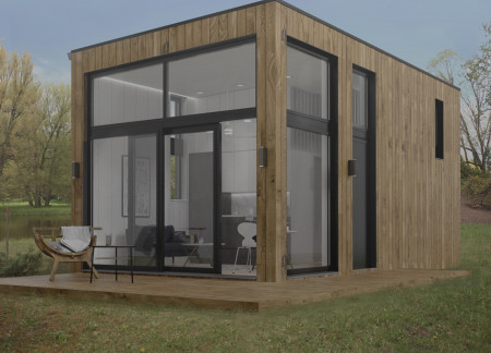 Charred Wooden Shingles and Glass Facade Elevate Sustainable Retreat in Natural Landscape
