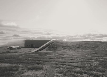 Basalt and Glass Structure Embracing Wind-Deflection and Natural Light Within a Community Hub