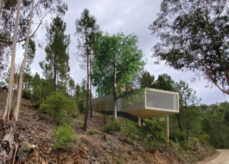 Elevated Construct with Local Stone and Expansive Glazing for Mindful Living  