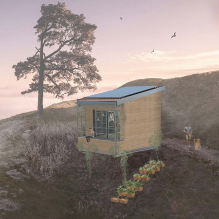 Charred Wooden Shingles and Photovoltaic Panels in a Sustainable Wellness Retreat  