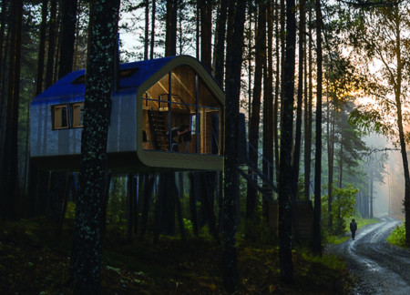 Elevated Zinc Cladding and Glulam Framework in a Forest Retreat