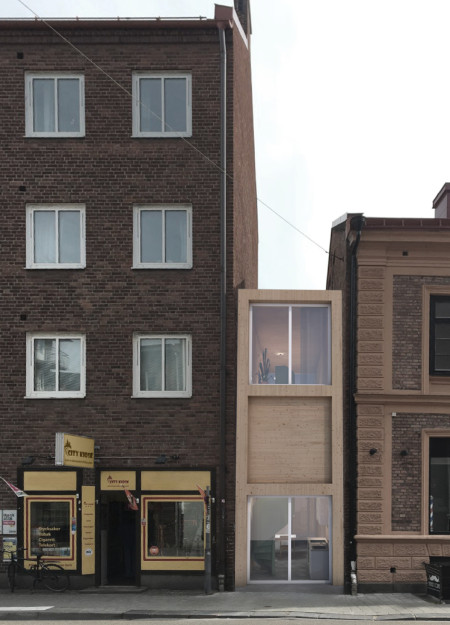 Charred Wooden Shingles and Cross-Laminated Timber Panels Define a Modern Urban Residential Community  