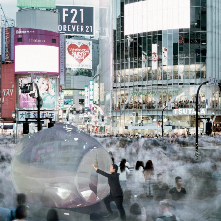 Transparent Acrylic Structure with Solar Integration Offering Urban Retreat in Tokyo