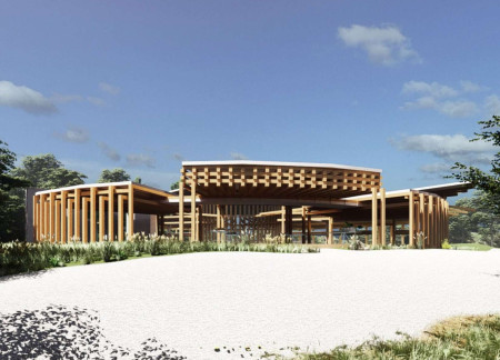 Circular Space Crafted With Chestnut and Granite Amidst Nature for Community Engagement