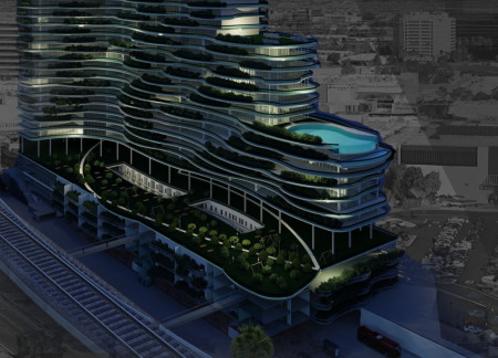 Curvaceous Glass Façade and Sustainable Solar Panels Redefine Urban Living in Adaptive Reuse Housing