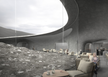 Curvilinear Concrete Form Nestled Among Volcanic Rock With Integrated Natural Lighting