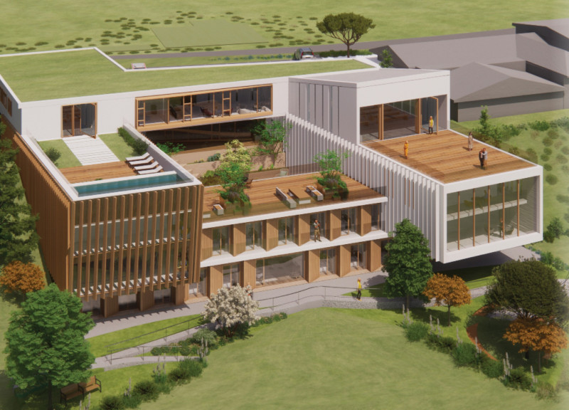 Community hub featuring exposed concrete and living walls in a sustainable urban setting