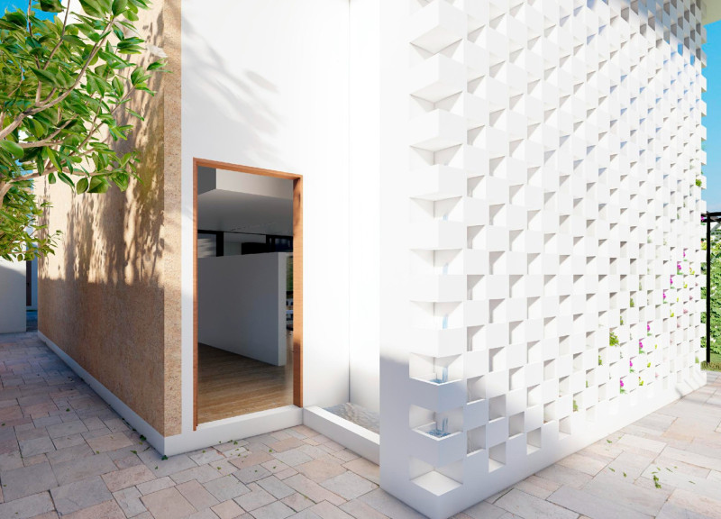 Charred Wooden Shingles and Natural Light Define Sustainable Urban Living Space