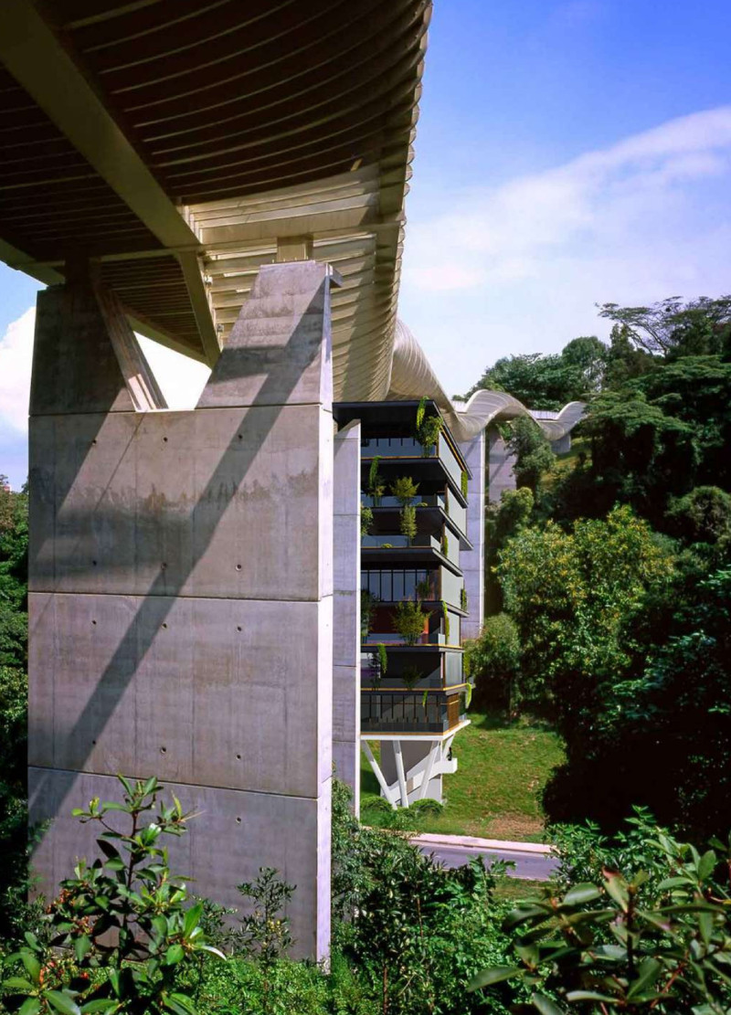 Residential development featuring vertical gardens and cantilevered balconies in a sustainable urban context