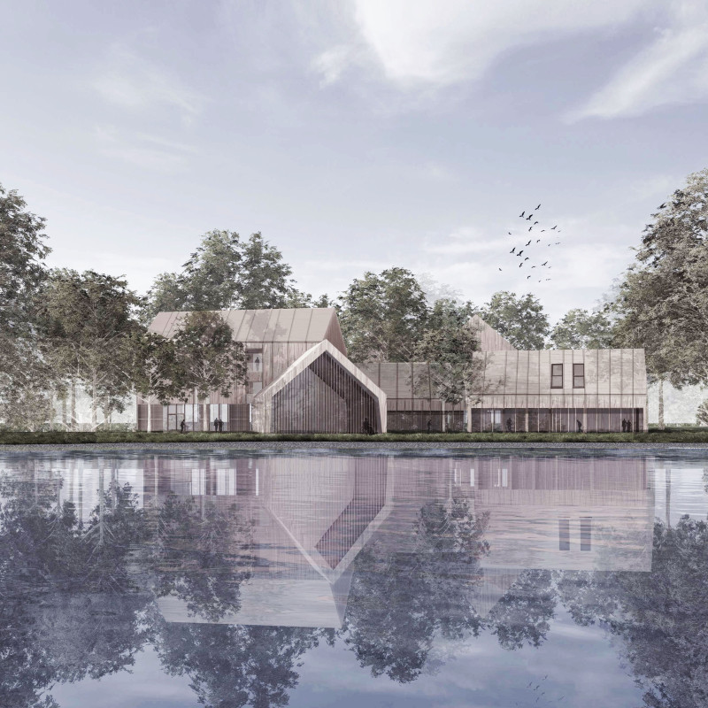 Weathered Steel And Natural Light Create A Biophilic Community Space With Adaptive Reuse Elements  