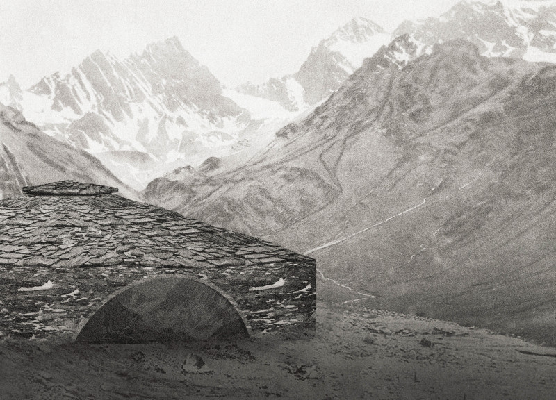 Circular Shelter Featuring Local Stone and Charred Wooden Shingles in Mountainous Terrain  