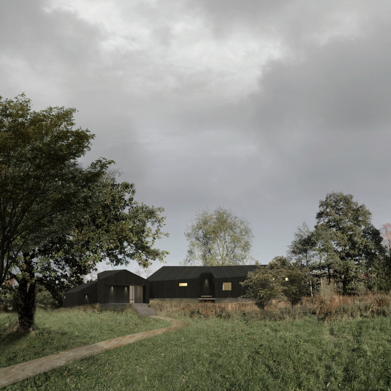 Charred Wooden Shingles and Gabled Cabins Create a Retreat that Connects with Nature
