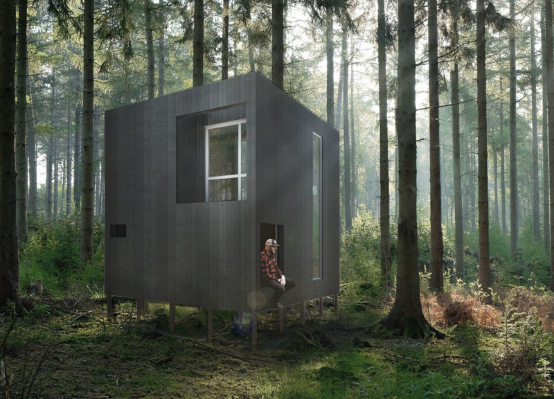 Framed Views of Nature With Charred Wooden Finishes and Elevated Timber Structure  
