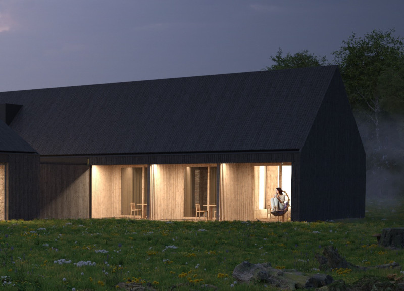 Charred Wooden Shingles and Natural Integration in a Sustainable Guest House