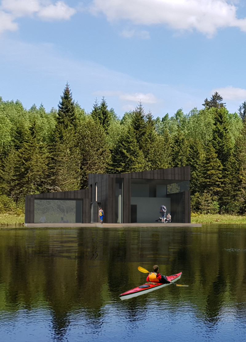 Charred Timber Cladding and Large Glass Openings Create a Harmonious Retreat in a Forested Landscape