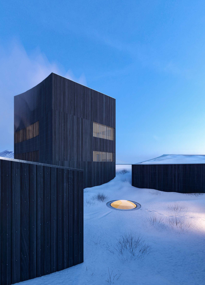 Charred Wooden Shingles and Expansive Glass Openings in a Harmonious Living Space  