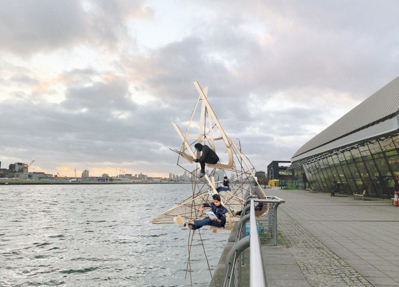 Bending Cardboard Seating Within Translucent Water-Resistant Spaces for Community Engagement