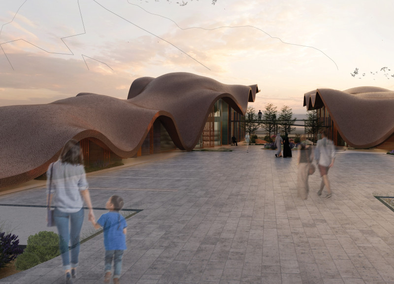 Curved Roof Structure with Rammed Earth Walls Addressing Environmental Sensitivity and Community Engagement