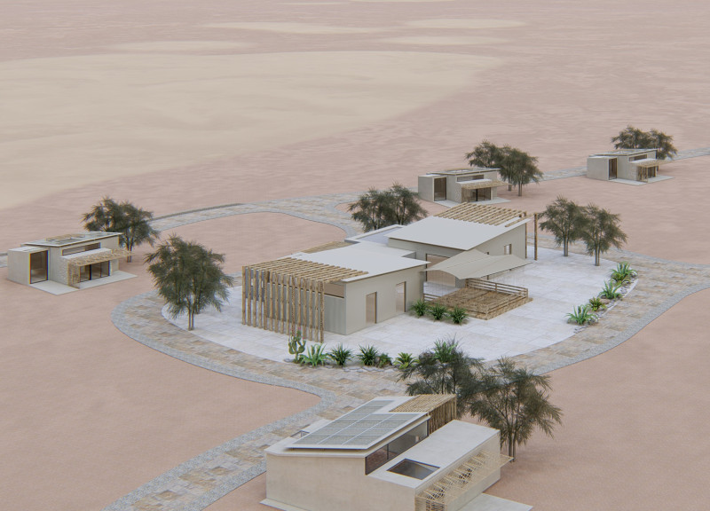Eco-friendly lodges featuring sand-brick construction and sustainable energy systems in a desert landscape