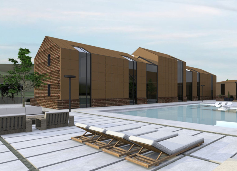 Terracotta Facades and Reclaimed Brick Harmonize in Sustainable Guest Accommodations