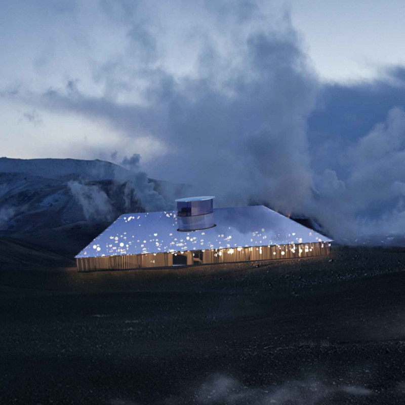 Community Gathering Space Emphasizing Natural Stone and Photovoltaic Glass in a Volcanic Landscape