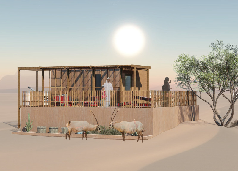 Natural Palm-Frond Canopy Overlooks Circular Eco Lodge in Desert Landscape