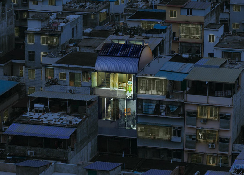 Charred Wooden Cladding and Solar Integration in a Compact Urban Living Solution  