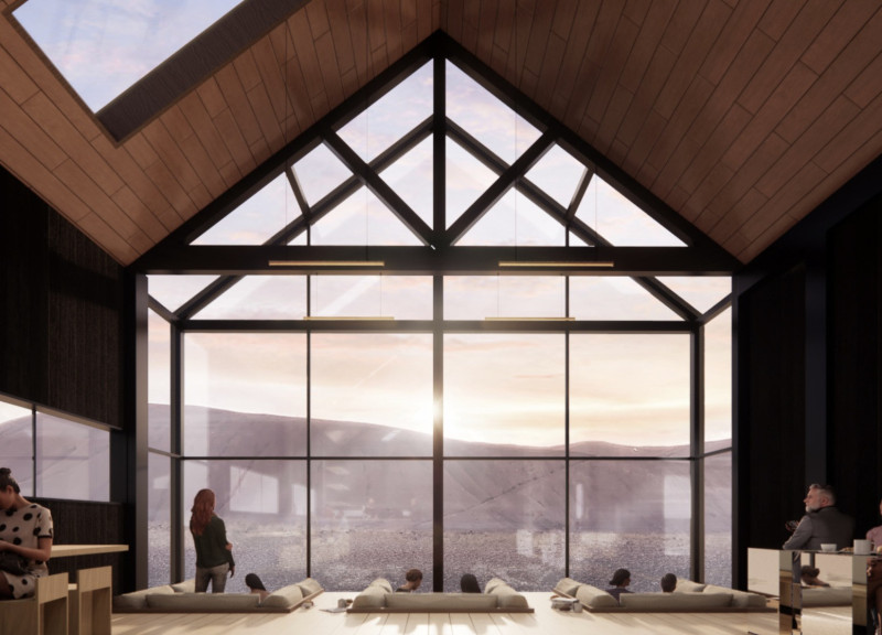 Charred Timber Cladding Reflecting Volcanic Landscape in a Cozy Hiker Café