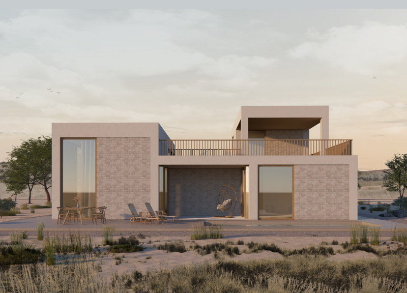 Contemporary coastal residence embracing natural stone cladding and expansive glass facades