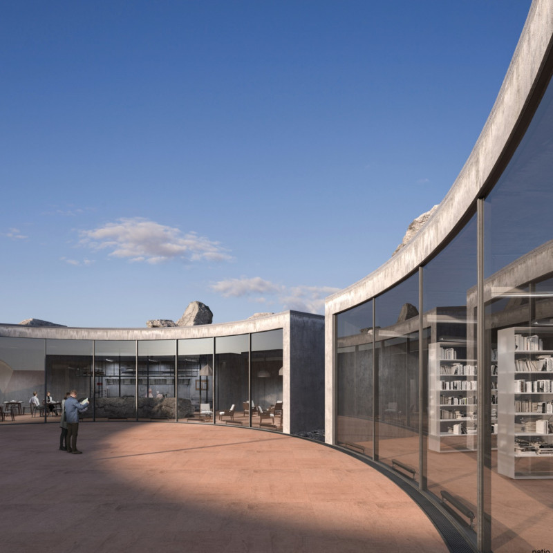 Geothermal Community Center Crafted with Natural Stone and Transparent Facades Nestled in a Volcanic Landscape
