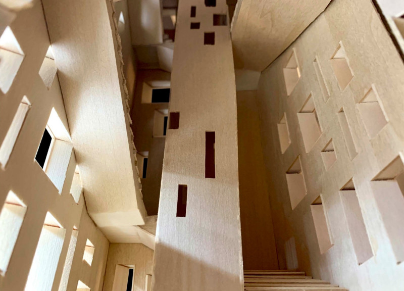 Tapered Copper Cladding Harmonizes With Natural Stone in an Elevated Observation Tower